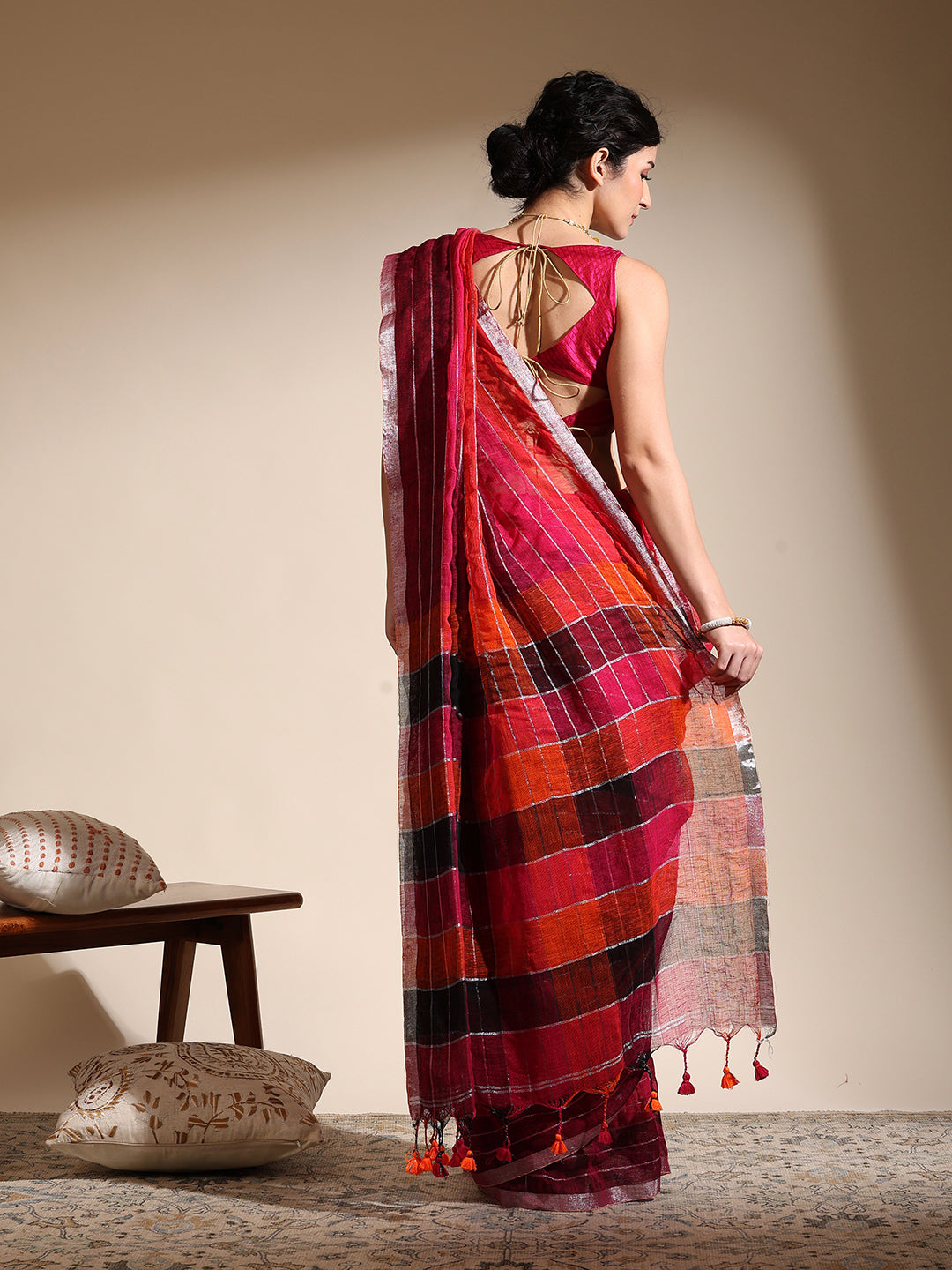 Multi-colored linen saree with silver zari interlacing