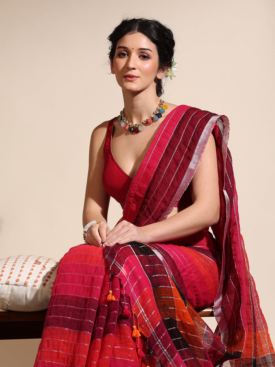 Multi-colored linen saree with silver zari interlacing