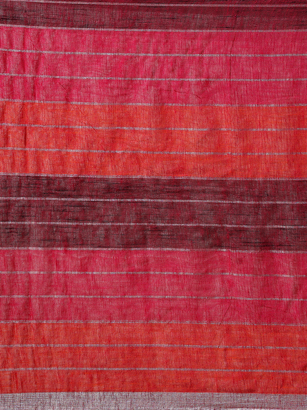 Multi-colored linen saree with silver zari interlacing
